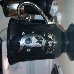 Disneyland Resort Diamond Celebration Disney Black Ceramic Mug 12 Oz.    5" Tall